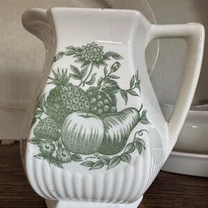 White  Pitcher with Green Fruit Design
